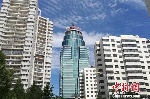 地方两会部署楼市：坚持房住不炒 放宽落户限制