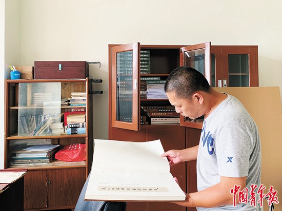 三轮车夫被破格录取博士前后