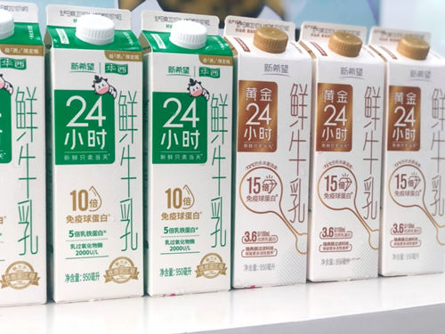 两岸记者团参观新华西乳业工厂 见证科技乳品智造
